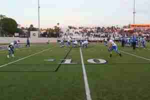 WATCH: Ex-Gunn Poloist Makes History as Female Football Coach